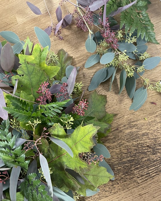 Seasonal foliage laid out for a workshop