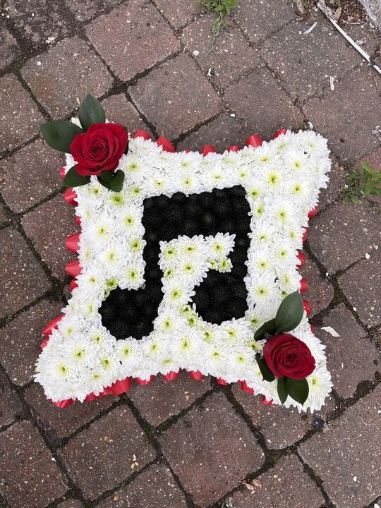 Bespoke musical note funeral tribute