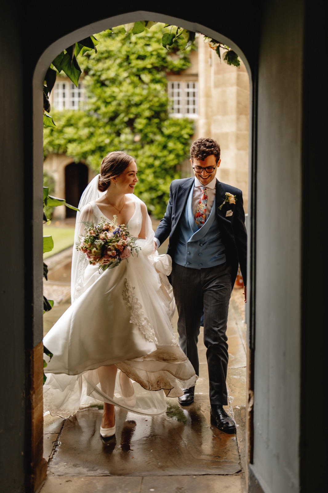 Katherine and Jamie at Sidney Sussex College with flowers by Gin House Flowers
